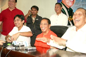 Board Member Jujun Tupas, Mayor Jejomar Binay of Makati and Gov. Niel Tupas Sr.,