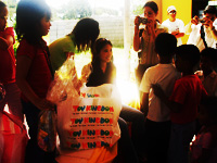 Angela Lopez-Guingona and her three lovely daughters gave away packs of school supplies to the GK children