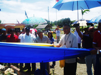 Mr. Oscar Lopez and Archbishop Angel Lagdameo unveils the Eugenio Lopez, Sr. Village Marker