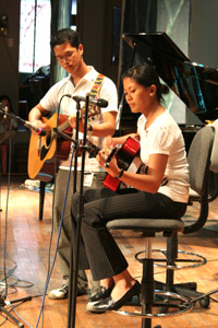 Pia playing guitar