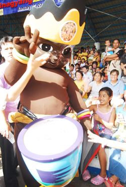 Young and old alike get amused with Dinagyang mascot Dagoy who walked around the Freedom Grandstand during last Friday's opening salvo