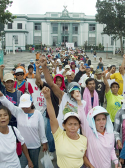 Farmers from Negros Oriental and Occidental march through Victorias plaza in Victorias town, Negros Occidental.