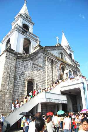 Devotees of the Our Lady of Candles flock to the Jaro Cathedral