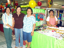 Gina Apostol and fellow members in the Ilonggo Microentrepreneurs Multipurpose Cooperative, Diday and Rose