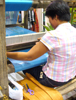 Connie Atijon, a weaver from Barangay Indag-an, Miag-ao demonstrates how to weave hablon