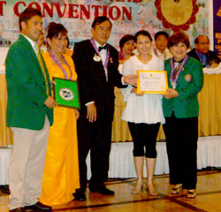 Iloilo Emerald Leo Club President Antonieta Gonzales received the International patch and 15 certificates awarded by Lions International for"Spotlight on Children" project of the Iloilo Emerald Leo Club