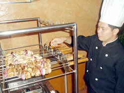 Frankie gets busy with the Chicken and Pork Belly Kebabs