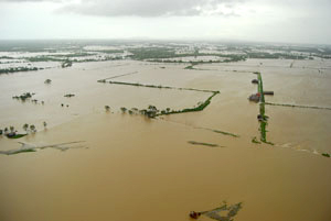 Aerial photo shows vast floodwaters engulfing farmlands and residential areas in Pavia, Iloilo