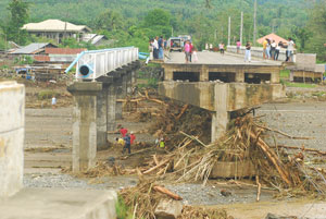 Almost half of the Imelda Bridge in Brgy. Amerang, Cabatuan was carried away by flood