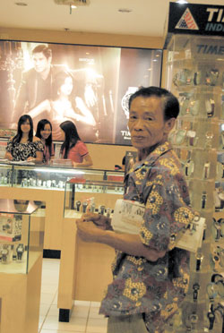 Manong Doming takes a stroll inside SM City.