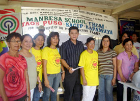 Atty. Jobert Peñaflorida (5th from left), ABS-CBN host and Executive Director of Taos Puso Foundation Inc. with the TPFI staff. 