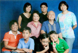 Femy with her husband Gil, children and grandchildren.