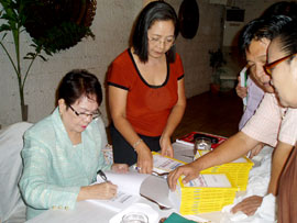 During a book signing at Hotel del Rio last June.