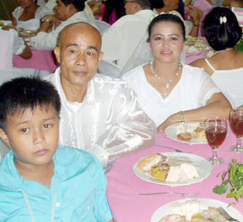 Marcelo Saavedra and Rosemary Abrere and kid.