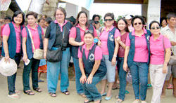 Iloilo Quotarians posing at the end of a hard days work last July 19, 2008 in front of Brgy. Tigum barangay hall. Left to right : PP Therese, PP Norma,PP Mariz, P Marjorie. Cristy, Chi, Donna, PP Celine and PDG Lea.