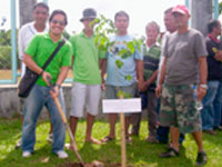 BM Rommel Lastimoso leads the ceremonial tree planting.