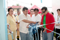 Mayor Jerry P. Treñas and Vice-Mayor Jed Mabilog cut the ceremonial ribbon during the blessing and inauguration of the Iloilo City Social Hygiene Clinic and City Proper District Health Center located at Tanza, this city. With Treñas and Mabilog are city medical officer IV Mae Delmo, Tanza parish priest Fr. Diony Suyom, Councilor Lex Tupas and city health officer Urminico Baronda, Jr.