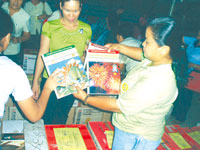 SB Jasmin Gange shows the books.