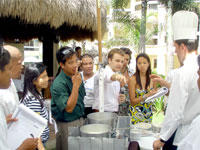Russian embassy officers and staff demonstrate preparation of Russian gourmet to Boracay tourism frontliners.