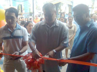 Ribbon cutting with Councilor Lex Tupas, Raymund Sebastian and Engr Ralph Pador.