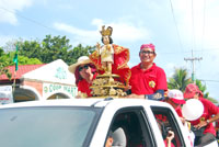 The image of the holy child Señor Santo Niño on board one of the vehicles that joined the motorcade prior to the launching ceremony of Dinagyang Festival 2009 at SM City Iloilo yesterday