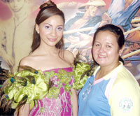 The fiesta queen with Sta. Barbara first lady Ma Luisa Maquino.