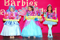 The winners in the Barbie Look Alike Contest.