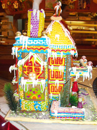 Colored Royal icing complete the house interiors.