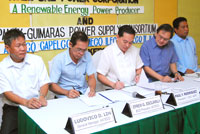Officials of Antique Electric Cooperative (from left) General Manager Ludovico Lim and President Efren Esclavilla sign the power supply agreement with Asea One Power Corp. (AOPC) officials President / CEO Paul Rodriguez and Vice Pres. for Finance Ernesto Tan.