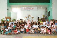 FCC executive officers and deans with the adopted families of the college.