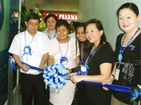 The cutting of ribbon with health and social welfare representatives and Girlie Libo-on, SM City Iloilo manager.