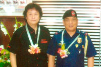 Yoshiaki Taneda, President of Yamaha Motor Phil. Inc. and Philippine National police Special Action Force Director, Chief Supt. Leocadio Santiago Jr.
