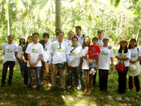 Mario Tajanlagit and e Cube International staff with members of the media.