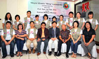 Mayor Evelio Leonardia (center) with the Korean Medical Mission led by Prof. Sun Jun Kim, M.D. (seated beside Leonardia, left side). Also in photo are City Health Officer Salome Bias (seated, second from left), Councilor Napoleon Cordova (seated, third from right) and Executive Assistant Edwina Javier (seated, extreme right).