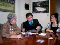Broadcaster Jay Balnig of Aksyon Radyo Iloilo interviews Stockton City deputy city manager, Christine Tien, as Stockton Sister Cities Association President Rose Marie Dime, looks on. Balnig was in California to cover the historic Nov. 4, 2008 US presidential elections.