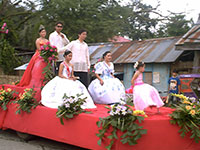 Ladies and gentlemen on a float during the parade.