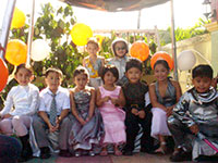 Young ladies and gentlemen in their formal wear and costumes.