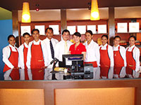 Carlo and Raissa Trenas with the Carlo's crew.