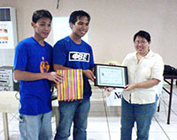 Presentation of a plaque of appreciation  to Maezel Jeongco by Jozyril Jalique and Josip Sevillano.