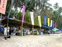 A line of food stalls.