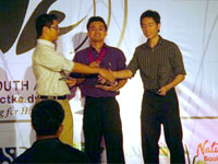 Ralph Oliver Layco (middle) during the giving out of awards.