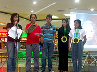 Eco Populi President Sherwin Hembra, 1st Prize winner Roque John Latosa, Mayor’s Executive Asst. Maria Grasha Chua, and DENR's Rhodora Capulso.