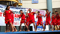 Kids learn the art of Muay Thai.