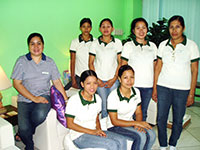 Anea Nail Spa's manager Carmen Mabunay (in striped shirt) with the therapists.
