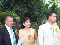 Parents Boy and Marilou Montalbo with groom  Matt Jester waiting for the bride, Caroline.