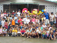 Arman and the kids with McDonald's mascots.