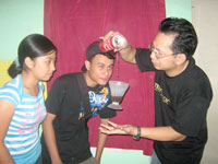 Java pours softdrinks on a levitating cup.