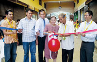 The ribbon cutting with Dr. Carmelo Ambut, Jun Gustilo, Jude & Dr. Ruby Sabala, Mayor Adolfo Jaen and Christopher Barredo.