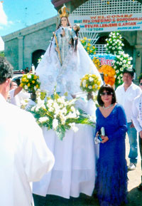 Tapaz's May Flower Festival Hermana Mayor for life Au Palomar with her beautiful Virgin Mary and Child.