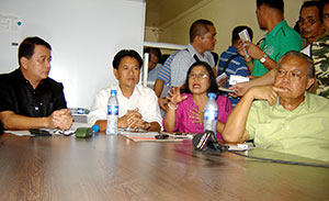 Pavia Municipal Social Welfare Officer Luz Sanchez explains to the complainants from Brgy. Anilao why the financial assistance intended for them is still unreleased.